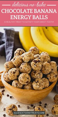 chocolate banana energy balls in a wooden bowl next to bananas and chocolate chips on the table