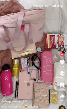 the contents of a pink bag are laid out on a white bed with sheets and pillows