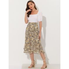 Featuring pretty ditsy floral prints, this midi skirt is a summer option that can be worn with just about anything. Channel elegant style in this midi skirt which is beautifully printed with a blossom pattern for a versatile look. It is made of lightweight fabric, adding definition to the free-flowing design. Falling to a waterfall midi hem, it sits high on the waist with a discreet side zip fastening. Summer days call for effortlessly feminine styles like skirts. Flowy Summer Midi-length Bottoms, Flowy Ruffled Midi Length Skirt, Summer Floral Print Flowy Maxi Skirt, Flowy Floral Print Maxi Skirt For Summer, Summer Floral Print Midi Maxi Skirt, Flowy Floral Print Maxi Skirt, Summer Floral Print Maxi Skirt For Day Out, Spring Midi Ruffled Skirt, Fitted Floral Print Maxi Skirt For Summer