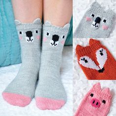 four pairs of socks with animals on them, one is pink and the other is grey