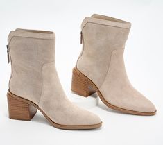 Now that boot season is finally here, it's time to step up your style game in a pair of suede stunners that are bound to become your new fave pair. Why? We can think of a few reasons:  A mid-shaft height is versatile enough to wear with the latest denim, leggings, skirts, and dresses. An understated back zipper provides easy entry and undeniable style. A stacked heel is totally walkable (and right on trend). Water-repellant suede(!!) is fashioned in rich hues that fit right in with your winter c Winter Suede Boots With Stacked Heel, Fall Suede Moto Boots With Reinforced Heel, Winter Mid-calf Suede Boots With Stacked Heel, Fall Suede Mid-calf Boots Medium Width, Suede Mid-calf Boots With Stacked Heel For Winter, Fall Beige Mid-calf Boots Medium Width, Chic Beige Mid-calf Boots With Round Toe, Chic Suede Mid-calf Boots Medium Width, Suede Mid-calf Boots With Stacked Heel And High Ankle