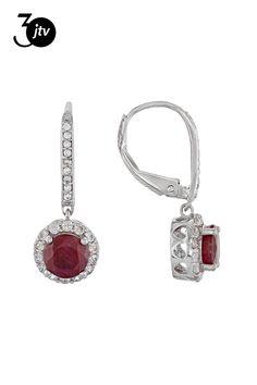 1.70ct round Indian ruby with .70ctw round white zircon rhodium silver sterling silver dangle earrings. Measure approximately 5/16"L x 1"W. Lever backings. Accent stones primarily zircon. Brilliant Cut Ruby Round Earrings, Silver Ruby Jewelry With Pave Setting, Ruby Earrings With Halo Setting, Sterling Silver Diamond Earrings With Lever Back, Ruby Round Earrings In White Gold, Classic Red Round Diamond Earrings, Red Round Cut Jewelry With Pave Setting, Red Round Cut Pave Set Jewelry, White Gold Ruby Earrings