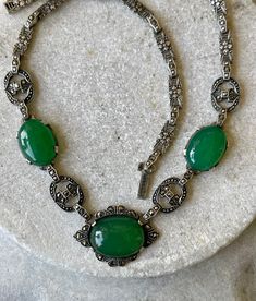 Circa 1920s Beautiful Authentic Art Deco Sterling Silver Green Chrysoprase Marcasite Vintage Antique Necklace Art Deco Jewelry Measeures aprox 17 inches around Vintage Oval Jade Necklace, Vintage Jade Necklace For Formal Occasions, Antique Green Oval Necklace, Vintage Green Emerald Necklace For Formal Occasions, Victorian Oval Green Necklace, Vintage Green Jade Necklaces, Ornate Green Oval Necklaces, Vintage Green Oval Necklace, Antique Green Gemstone Necklace