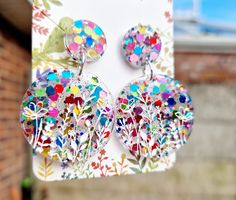 Our new large floral statement earrings  Are a must have this summer season . Colourful, bold , bright and beautiful! A fabulous gift for a loved one or friend or a perfect treat for yourself.  All of our jewellery is hypoallergenic and lightweight.  Specific Colour requests available please send us a message with your requirements 🙂 We also ship worldwide 🌍! Colourful Earrings, Earrings Round, Flower Gifts, Earrings Flower, Skull Earrings, Colorful Earrings, Earrings Statement, Large Flowers, Round Earrings