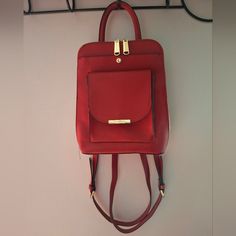 Steve Madden Red Bmarino Backpack *Nwot Excellent Condition Inside And Out *Adjustable Strap *Double Zipper Closure *Top Handle Strap *Gold Accented Hardware *Front Snap Closure Compartment *Front Flap Over Snap Closure Compartment *Interior Has Middle Zipper Close Compartment *Interior Has Zipper Pocket With 2 Open Slip Pockets *Signature Logo Lining Throughout *Measurements Are Approximately 10"L X 11"H X 3"W Red Satchel Backpack With Zipper Closure, Red Satchel Backpack, Red Leather Backpack With Adjustable Strap, Red Bag With Adjustable Straps For Everyday Use, Trendy Red Leather Backpack With Zipper Closure, Red Satchel Backpack With Adjustable Strap, Red Bags With Adjustable Straps For Daily Use, Red Rectangular Leather Backpack For School, Trendy Red Rectangular Backpack