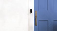 a blue door with a black handle on it