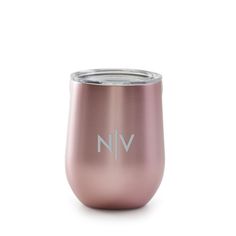 a pink wine tumbler with the word n v in white lettering on it and a silver lid