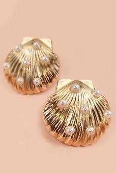 These earrings feature exquisite seashells delicately accented with lustrous pearls, evoking the serenity of the beach. Earrings are a final sale item Shell-shaped Pearl Earrings For Wedding, Pearl Shell-shaped Earrings For Wedding, Summer Pearl Earrings For Pierced Ears, Summer Pearl Earrings, Pearl Shell-shaped Wedding Earrings, Shell-shaped Pearl Earrings With Pearl Charm, Elegant Mother Of Pearl Shell, Pearl Shell Earrings With Pearl Charm, Elegant Shell Pearl Earrings