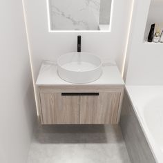 a white sink sitting under a mirror in a bathroom