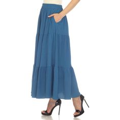 Elevate your fashion game with this flowy and effortlessly chic skirt. This maxi skirt from White Mark boasts a pleated design that adds texture, movement, and a touch of sophistication to your look. Dress it up or down as this skirt is incredibly versatile. Pair it with a tucked in blouse and heels for a sophisticated look or go for a more relaxed vibe with a tucked in tee and sandals and pair it with a jacket on chilly days. It’s perfect for various occasions and style preferences. Spring Relaxed Fit Tiered Maxi Dress, Spring Breezy Gathered Maxi Skirt, Breezy Tiered Maxi Skirt, Breezy Flowy Long Maxi Skirt, Flowy Breezy Maxi Skirt For Day Out, Breezy Flowy Maxi Skirt For Day Out, Breezy Maxi Skirt For Day Out, Spring Breezy Flared Maxi Skirt, Breezy Tiered Flowy Maxi Skirt