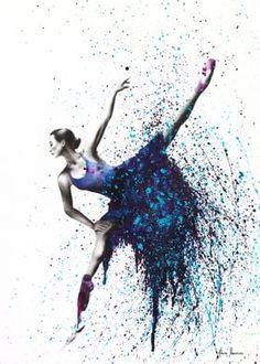 a woman is dancing in the air with blue paint splatters all over her