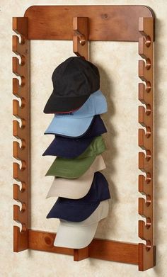 there is a hat rack with hats on it