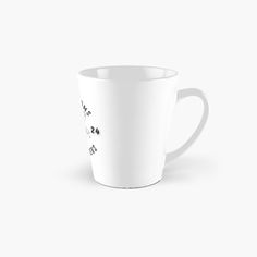 a tall white mug with black writing on it