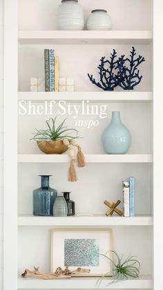 shelves with vases and other items on them