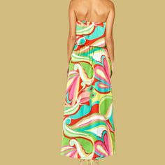 Make a splash in the Calista Satin Maxi Dress. This bold and colorful piece flatters the figure with its timeless fit, while its shimmering satin fabric adds a touch of glamour. Feel beautiful and confident any night of the week! Material100% Polyester Multicolor Maxi Dress For Evening Parties, Multicolor Maxi Dress For Cocktail Party, Multicolor Maxi Dress For Cocktail Party Season, Elegant Multicolor Maxi Dress For Party Season, Silk Evening Dress With Vibrant Print, Elegant Multicolor Strapless Midi Dress, Vibrant Fitted Green Maxi Dress, Green Satin Strapless Dress For Summer, Sleeveless Midi Dress With Vibrant Print For Party