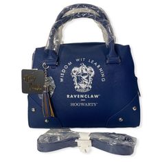 harry potter handbag with hogwarts lanyard charm and keychain in plastic wrap