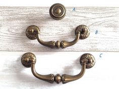 an image of a door handle on a white wooden surface with measurements for the handles