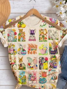 Cute Multicolor T-shirt For Spring, Multicolor Tops With Funny Print For Spring, Spring Cotton Tops With Character Print, Multicolor Cartoon Print T-shirt For Spring, Fun Cartoon Print Spring Tops, Casual Cartoon Print Short Sleeve Spring Tops, Casual Cartoon Print Short Sleeve Tops For Spring, Fun Cartoon Print Tops For Spring, Casual Short Sleeve Cartoon Print Tops For Spring