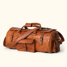 Vintage Buffalo Leather Full grain travel Duffle Rugged Large Capacity Duffle Bag For Travel, Rugged Duffle Bag For Overnight Trips With Large Capacity, Rugged Large Capacity Duffle Bag For Overnight Trips, Rugged Travel Satchel With Waxed Finish, Rugged Waxed Finish Satchel For Travel, Rugged Satchel With Waxed Finish For Travel, Rugged Large Capacity Bags For Overnight Trips, Rugged Travel Bag, Rugged Leather Bags For Outdoor