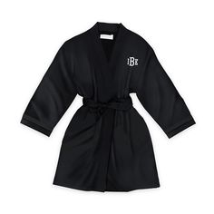 a black robe with white letters on it