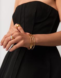 Trio Molten Ripple Bangle Bracelet Set | 18k Gold Vermeil. More is More. Make a Statement with this Standout Bracelet Set, Featuring Three of Our Molten Ripple Bangles. This Delicate Bangle Bracelet Features an Organic-Inspired Shape with Our Signature Molten Wavy Detailing. Stack All Three Together, Balance Out Across Both Wrists, or Wear Solo for Endless Ways to Style. Worth $693, Save $84 When Buying Together. Metal: 18K Recycled Gold Vermeil on Recycled Sterling Silver Small Band Width Varie Small Band, Trending Bracelets, More Is More, Bangle Bracelet Set, Earring Trends, Diamond Gift, Bangles Style, Festival Jewelry, Fancy Jewelry