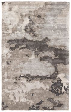 a gray and black rug with clouds in the sky on it's side,