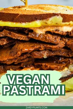 there is a sandwich made with meat and cheese on the side that says vegan pastrami