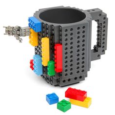 a coffee mug made out of legos is shown with instructions for how to use it