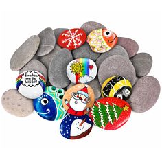 a pile of rocks with different designs on them