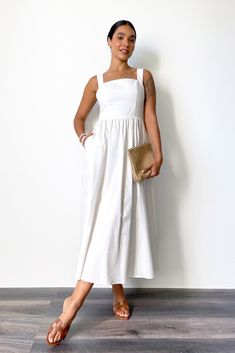 Introducing the Annabelle maxi dress, a timeless classic crafted from exquisite linen cotton. Featuring a flattering, elegant silhouette and a low cross back detail, this white dress is perfect for any special occasion. Make a statement and feel luxurious in this sophisticated Lakeyo exclusive piece. Our model is wearing a size S. She usually wears size AU 8 and is 173cm (5.8) tall with a 78cm (31”) bust, a 58cm (23”) waist and 91cm (36”) hips. - Length: Maxi - Lower cross back design - Back zip Overal Dress, Wool Winter Coat, Winter Pants, Winter Tops, White Maxi Dresses, Back Design, Pocket Detail, Timeless Classic, Wool Coat