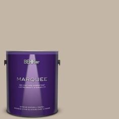 the behrot marquee paint is shown in an open, dark purple color