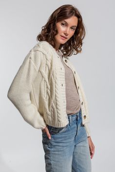 The Alicia Adams Alpaca Buckley Cardigan is a brand new cable knit cardigan. With bold colors and twisting cable knit details, this baby alpaca cardigan creates an effortless elevated look. 100% baby alpaca | dry clean only Proudly fair-trade made in Peru. Alpaca Clothing, Alpaca Cardigan, Crisp White Shirt, Heavy Knit, Cable Knit Cardigan, Cardigan Black, Baby Alpaca, City Style, Luxury Goods