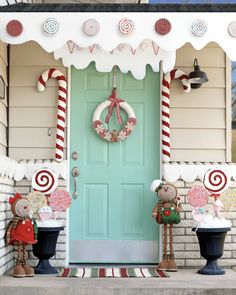 a front porch decorated for christmas with candy canes