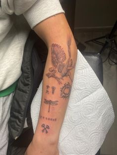 a person with a tattoo on their arm