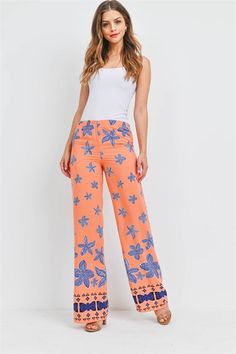 Stretch waistband floral print wide leg pants. Vacation Floral Print Wide-leg Pants, Floral Print Wide-leg Pants For Vacation, Printed Wide-leg Pants For Vacation, Floral Print Wide Leg Beach Pants, Vacation Floral Print Wide Leg Pants, Printed Wide Leg Bottoms For Vacation, Wide Leg Printed Vacation Bottoms, Vacation Wide Leg Printed Bottoms, Vacation Wide Leg Printed Pants