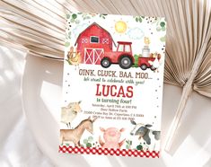 a birthday party with farm animals on the front and back of it, including a red truck