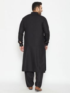 VASTRAMAY Men's Plus Size Black Cotton Blend Pathani Set VASTRAMAY Men's Plus Size Black Cotton Blend Pathani Set Black solid knee length pathani straight kurta, has a shirt collar, long sleeves with cuff, button placket, two patch pockets, curved hem, side slits. Black solid Pyjama, has drawstring closure Features Of VASTRAMAY Men's Plus Size Black Cotton Blend Pathani Set Natural fibers Solid colors Floral prints Specifications Sleeve Length - Long Sleeves Top Shape - Straight Top Hemline - Cu Fitted Black Kurta With Stand Collar, Casual Black Festive Kurta, Black Traditional Kurta With Stand Collar, Black Straight Kurta For Casual Wear, Black Fitted Kurta For Winter, Casual Black Straight Kurta, Winter Black Fitted Kurta, Black Straight Kurta For Winter, Black Long Sleeve Winter Kurta