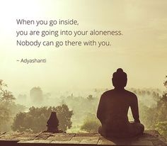 a buddha statue sitting on top of a stone wall with a quote above it that says, when you go inside, you are going into your aloneness nobody can go there with you