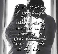 a couple kissing in front of a window with the words i am thinking of you tonight and