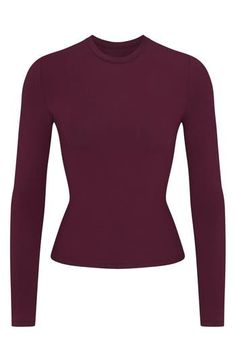 A tried-and-true classic, this fitted long-sleeve T-shirt cut from stretch-enhanced cotton jersey is from Kim Kardashian's highly sought-out SKIMS collection. 21" regular length (size Medium) Crewneck Long sleeves 90% cotton, 10% elastane Machine wash, tumble dry Imported Stretch Elastane Long Sleeve Top For Fall, Long Sleeve Tops With Thumbholes, Long Sleeve Tops With Thumbholes And Minimal Stretch, Second-skin Crew Neck Tops With Thumbholes, Stretch Long Sleeve T-shirt With Thumbholes, Stretch Elastane Tops For Fall, Basic Long Sleeve Tops With Thumbholes, Solid Crew Neck Top With Thumbholes, Classic Fitted T-shirt For Fall