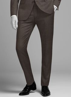 Transform every moment into a memorable one with our Napoleon Mini Houndstooth Brown Wool Suit. This ensemble features the classic mini houndstooth pattern in a rich brown shade, offering a visual texture that is both subtle and striking, designed to effortlessly enhance your silhouette, ensuring comfort and ease of movement - a perfect companion for a variety of occasions. Whether attending a close friend's wedding, leading an important business meeting, or enjoying an upscale evening event, this suit will be your ideal choice.  Look Includes   Napolean Mini Houndstooth Brown Wool Fabric  Two Button Jacket Style  Notch Lapel  Horn Brown Buttons  Single Vent  Three Cuff Buttons  Two Welted Back Pockets on Trousers   Click 'Customize Now' to modify the look if needed.  Lining: Viscose, Dry