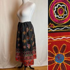 "This has a lot of charm! A very black, somewhat heavy cotton peasant style skirt with embroidery all around. Some of which includes little rooster/ chicken figures. It's very vibrant & colorful. In excellent condition. Seems unworn and or very original. Semi structured weighted cotton.  I feel the size is somewhat open, small to a medium. Please check measurements below.  It's in great shape.  ✏️ ✏️✏️DETAILS ✏️✏️✏️ Brand: hand made/ none Size on tag:- Fits like: Small to medium  Color:  black w Traditional Black Skirt For Summer, Black Cotton Skirt For Festival, Traditional Cotton Skirt For Festival, Traditional Gathered Cotton Skirt, Traditional Black Cotton Skirt, Traditional Embroidered Black Skirt, Traditional Black Embroidered Skirt, Long Embroidered Cotton Skirt, Black Cotton Bohemian Skirt