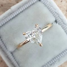 an engagement ring with a princess cut diamond