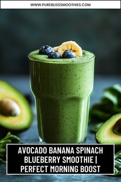 an avocado banana spinach smoothie with blueberries and bananas in it