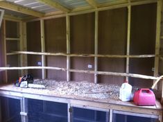 the inside of a house being built with wood and other items on top of it