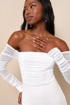 You're sure to be the center of attention any evening with the romance-ready look of the Lulus Elegant Eternity White Mesh Ruched Off-the-Shoulder Mini Dress! This trendy little number features stretchy sheer mesh (atop a matching knit liner) that shapes a ruched bodice and an off-the-shoulder neckline with hidden no-slip strips, all framed by long ruched sleeves. The high, fitted waist tops a crepe knit bodycon skirt that ends at a flirty mini hem. Hidden back zipper/clasp. Fit: This garment fi Evening Off-shoulder Mini Dress With Ruched Bodice, Off-shoulder Mini Dress With Ruched Bodice For Evening, Off-shoulder Party Mini Dress With Ruched Bodice, Off-shoulder Mini Dress With Ruched Bodice For Party, Glamorous Off-shoulder Mini Dress For Dinner, Off-shoulder Ruched Mini Dress For Formal Occasions, Off-shoulder Ruched Mini Dress For Evening, Flirty Ruched Mini Dress For Wedding, Off-shoulder Ruched Mini Dress For Wedding