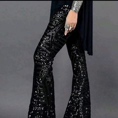 Black Hi-Waist Sequin Flare Leg Trousers Knitted Fabric 95% Polyester 5% Elastane Trendy Stretch Bottoms With Sequins, Trendy Stretch Sequined Bottoms, Trendy Sequined Bottoms For Fall, Glamorous Fitted Black Bottoms, Non-stretch Trousers For Night Out, Chic Stretch Sequin Bottoms, Black Stretch Glamorous Bottoms, Black Sequined Straight Leg Pants, Stretch Sequined Bottoms For Fall