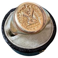 Latin translation: Sub Alis Sto, "We stand under our wings" Size: 7.25 Weight: 8 grams Measurements: 14.4 mm north to south Markings: BBB, 14k, script in side the ring reads, "MCG '70", under the fleur de lis are the initials "Ma" Vintage Oval Signet Ring, Vintage Oval Signet Ring, Tarnish Resistant, Victorian Oval Signet Ring With Intaglio, Antique Oval Hallmarked Signet Ring, Libra Signet Ring, Gold Art Deco, Cabochon Ring, Platinum Engagement Rings, Natural Jade