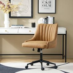 a brown office chair sitting on top of a white desk next to a black and white rug