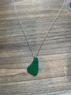 Handmade necklace made with Emerald Green sea glass from Mokule'ia Beach on the North Shore of O'ahu !  Length: 18in Material: Silver Plated Sea Glass Color: Emerald (Green) Comes with a card that includes jewelry care, information about sea glass, and information about the beach your piece of sea glass came from. 15% of the proceeds go towards the Maui Strong Fund to help the families impacted by the Lahaina fire. Private message me for custom order requests!!  Follow us on Instagram and TikTok Adjustable Green Recycled Glass Necklace, Green Recycled Glass Necklaces For Jewelry Making, Green Recycled Glass Pendant Jewelry, Green Sea Glass Necklaces For Jewelry Making, Green Sea Glass Necklace For Jewelry Making, Green Glass Jewelry With Adjustable Chain, Green Necklace With Adjustable Chain For Beach, Green Adjustable Chain Necklace For Beach, Handmade Green Sea Glass Necklace